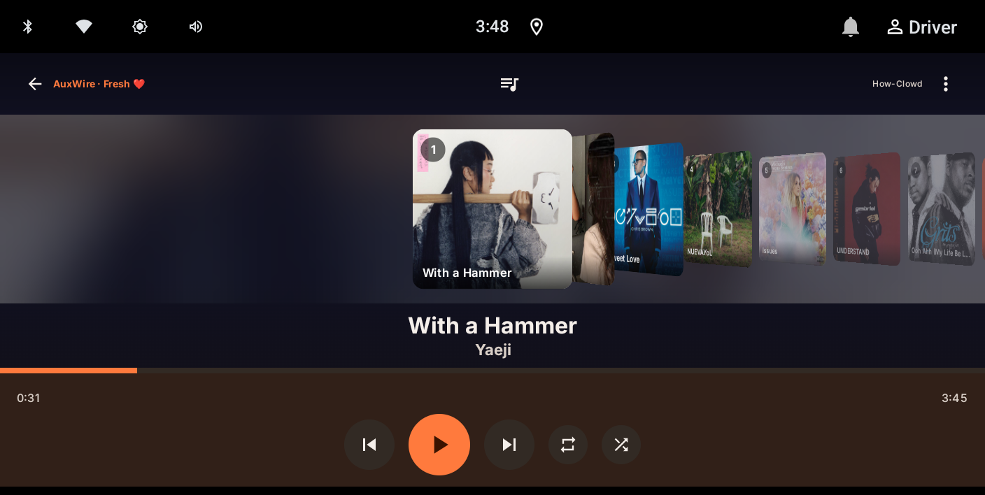 AuxWire's CoverFlow now-playing screen with a swipeable deck of album art
